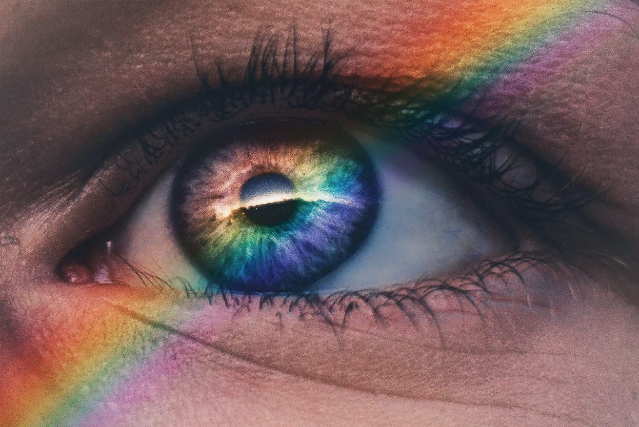 Rainbow cast across human eye