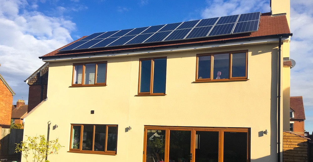 A roof-mounted solar panel installation on a residential property